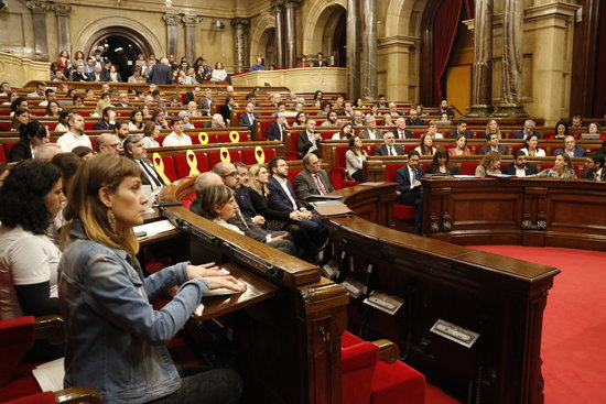 The Catalan parliament chamber with empty seats for the jailed and exiled leaders